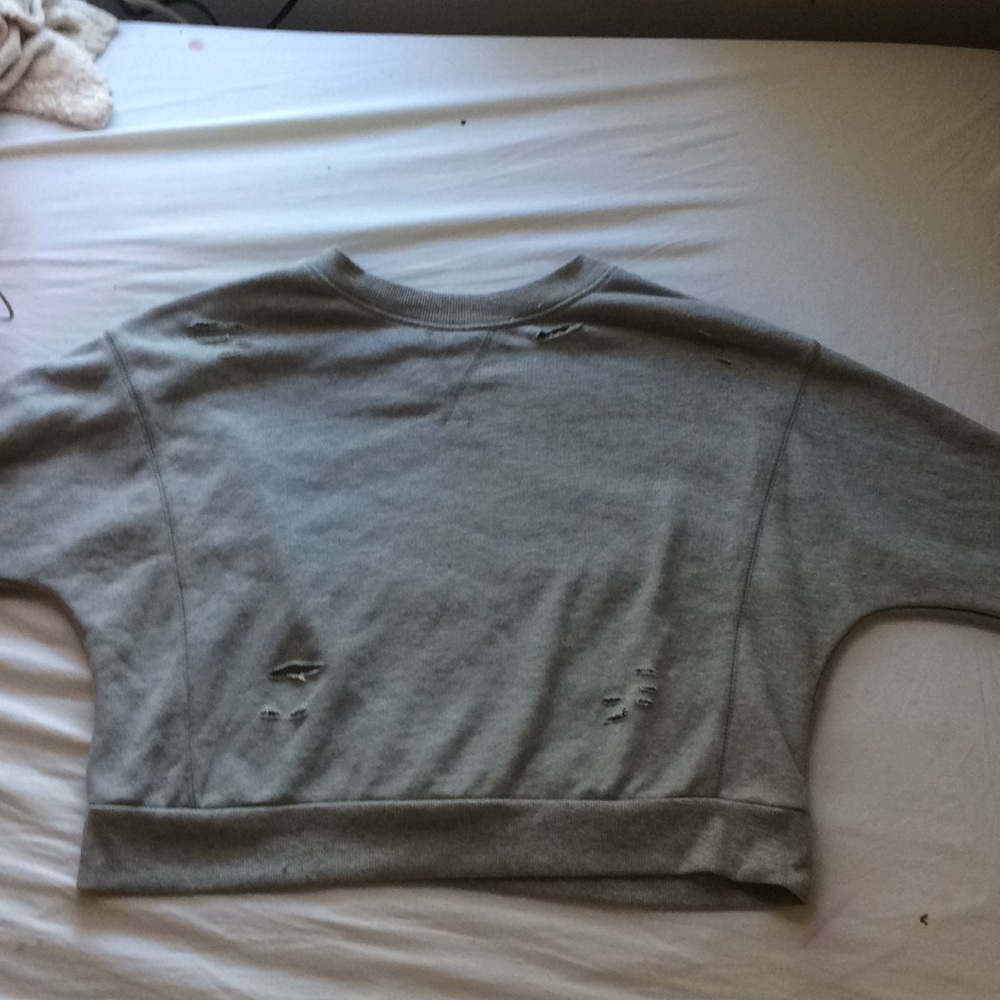 Cropped feet sweater